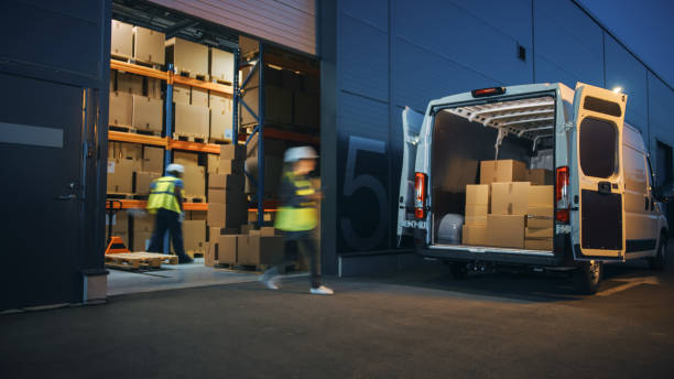 Warehouse team loading a delivery van